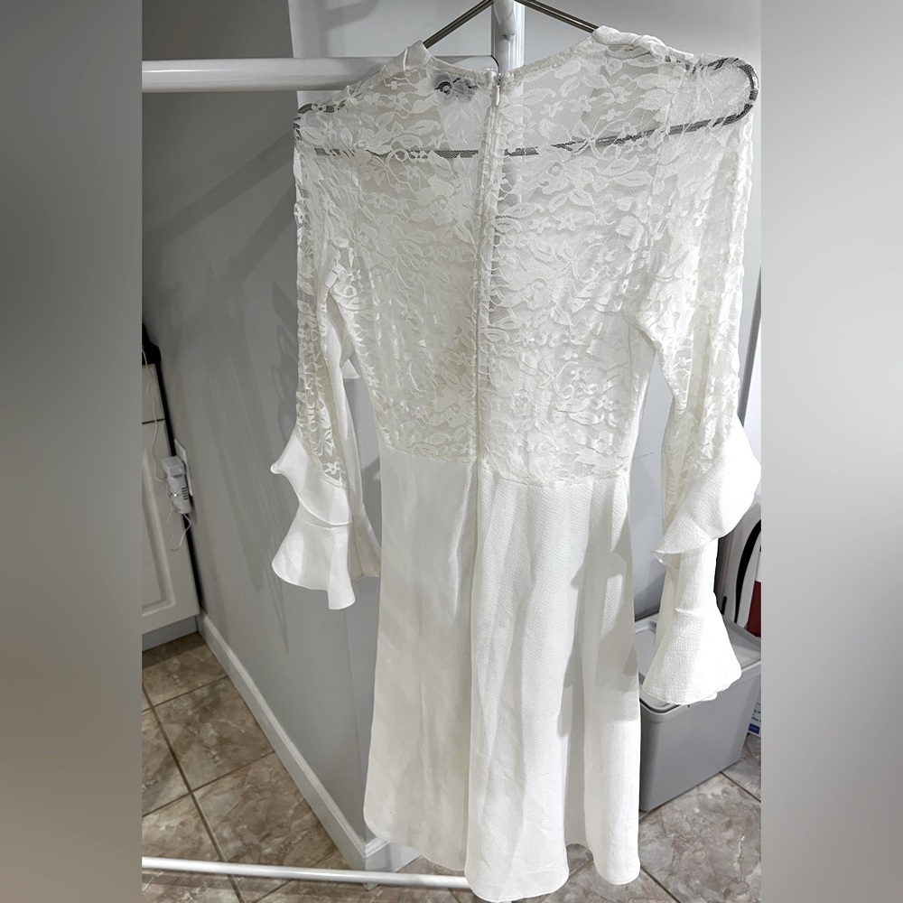 White dress with lace in back